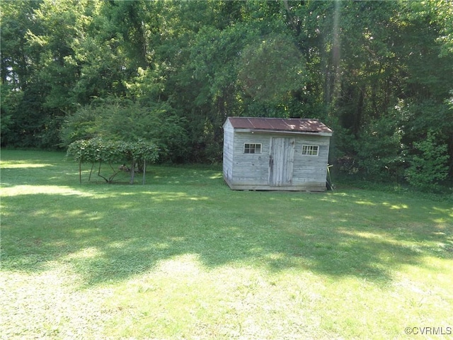 875 Islington Rd, Warsaw, VA 22572 - view of green lawn featuring a storage unit