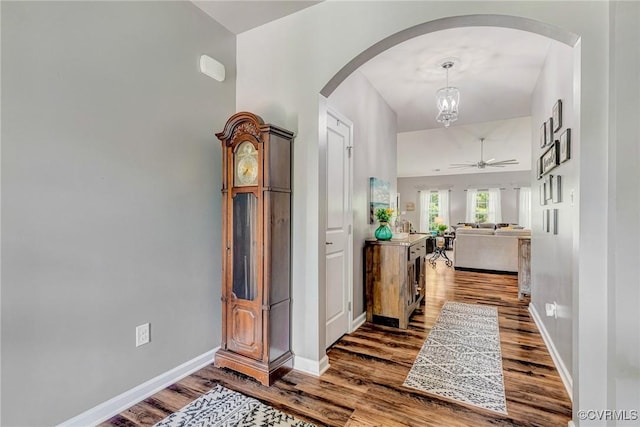 5858 Pilmour Dr, Providence Forge, VA 23140 - entrance foyer with wood finished floors, arched walkways, a ceiling fan, and a chandelier