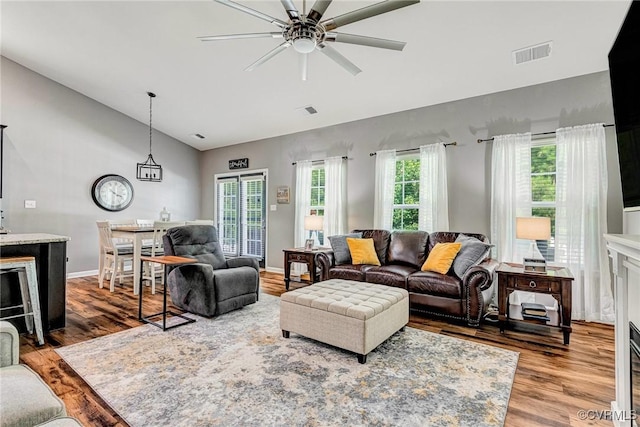 5858 Pilmour Dr, Providence Forge, VA 23140 - living room with ceiling fan, wood finished floors, and high vaulted ceiling