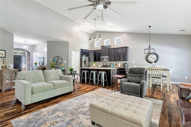 5858 Pilmour Dr, Providence Forge, VA 23140 - living area with a ceiling fan, dark wood-type flooring, and high vaulted ceiling