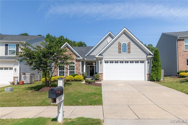 5858 Pilmour Dr, Providence Forge, VA 23140 - view of front of home with a front lawn and concrete driveway
