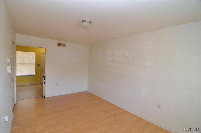 3515 Briel St Unit U104, Richmond, VA 23223 - empty room with light wood-style floors and baseboards