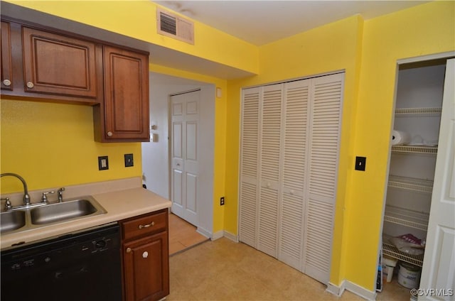 3515 Briel St Unit U104, Richmond, VA 23223 - kitchen featuring dishwasher and light countertops
