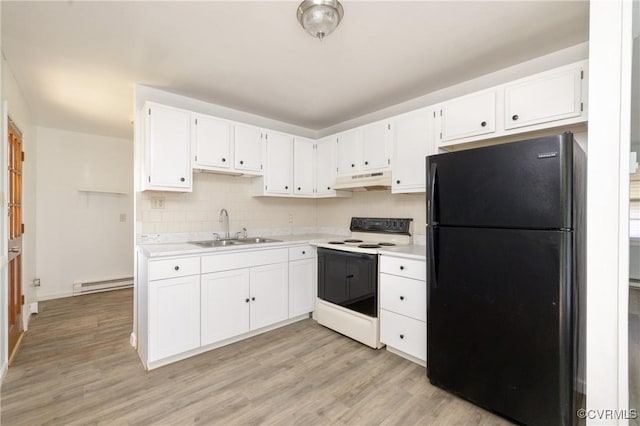 3317 Gaulding Ln, Richmond, VA 23223 - kitchen featuring freestanding refrigerator, white electric range oven, under cabinet range hood, white cabinets, and light countertops