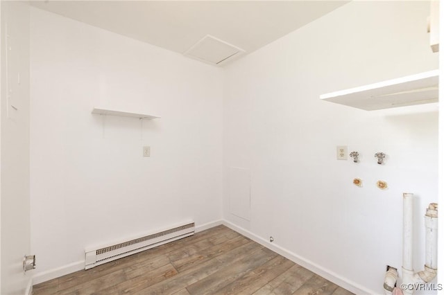 3317 Gaulding Ln, Richmond, VA 23223 - washroom with baseboard heating, light wood-style floors, washer hookup, and hookup for a gas dryer