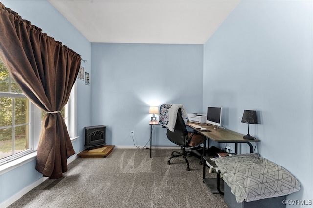 5129 Jenkins Forest Ln, Sandston, VA 23150 - carpeted office space featuring a wood stove and healthy amount of natural light