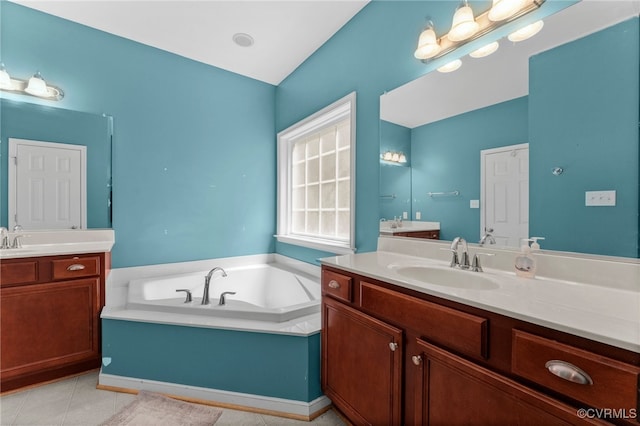 5129 Jenkins Forest Ln, Sandston, VA 23150 - full bath with two vanities, a garden tub, and tile patterned floors