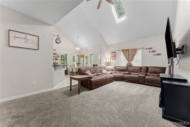 5129 Jenkins Forest Ln, Sandston, VA 23150 - carpeted living room with high vaulted ceiling, ceiling fan, and a skylight