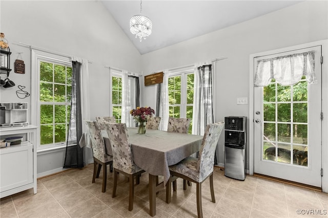 5129 Jenkins Forest Ln, Sandston, VA 23150 - dining space with a chandelier, plenty of natural light, light tile patterned floors, and high vaulted ceiling