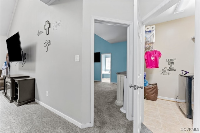 5129 Jenkins Forest Ln, Sandston, VA 23150 - hall with separate washer and dryer, light colored carpet, and lofted ceiling