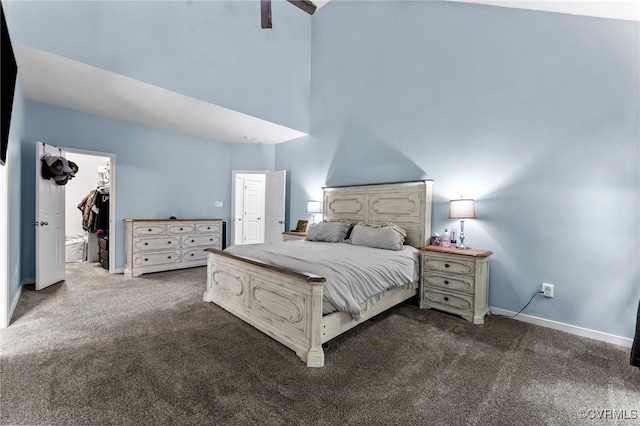 5129 Jenkins Forest Ln, Sandston, VA 23150 - bedroom with dark carpet and a walk in closet