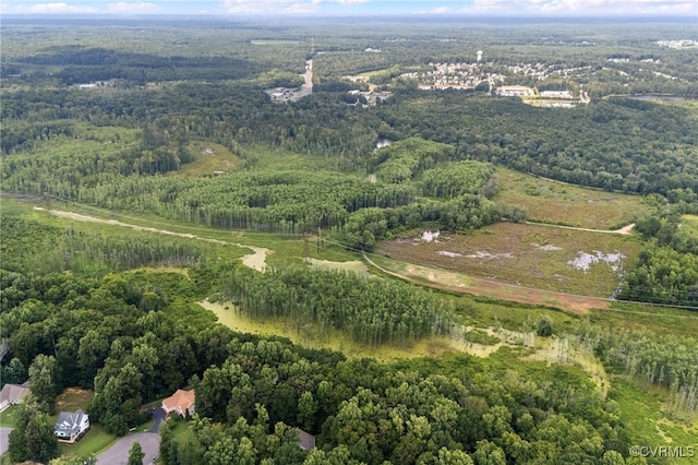5129 Jenkins Forest Ln, Sandston, VA 23150 - aerial view of property and surrounding area featuring a heavily wooded area