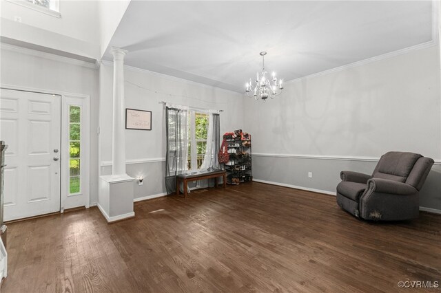 5129 Jenkins Forest Ln, Sandston, VA 23150 - entryway featuring decorative columns, wood finished floors, ornamental molding, and a chandelier