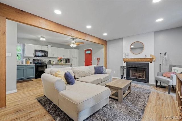 4606 S Run Ct, Chesterfield, VA 23234 - living room featuring a fireplace, beam ceiling, light wood-type flooring, ceiling fan, and recessed lighting