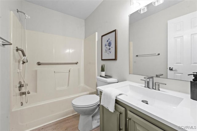 1900 Pine Creek Bluff Ct, Powhatan, VA 23139 - bathroom with vanity, wood finished floors, and  shower combination