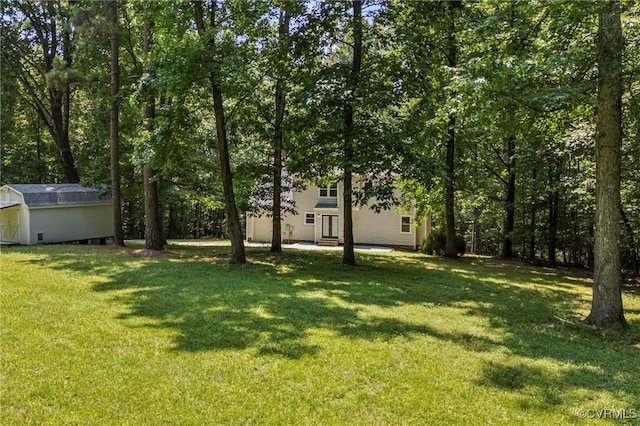 1900 Pine Creek Bluff Ct, Powhatan, VA 23139 - view of grassy yard with a shed and entry steps