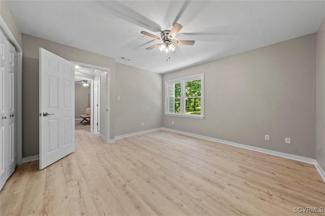 1900 Pine Creek Bluff Ct, Powhatan, VA 23139 - unfurnished bedroom featuring light wood-style flooring, a closet, and ceiling fan