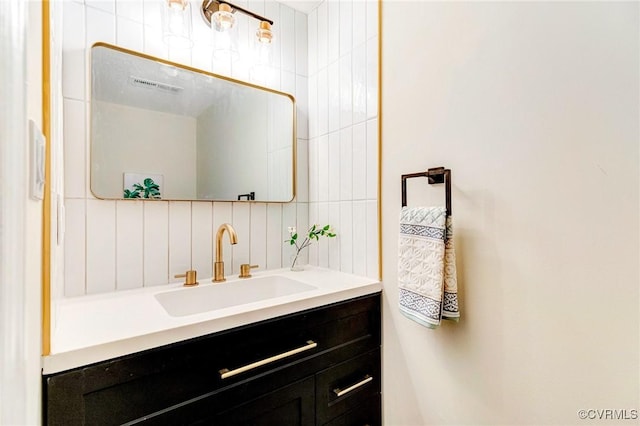 6910 Siliman Dr, Chesterfield, VA 23832 - bathroom with vanity and decorative backsplash