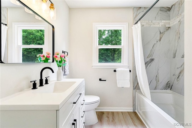 6910 Siliman Dr, Chesterfield, VA 23832 - bathroom with vanity, shower / bath combination with curtain, and wood finished floors
