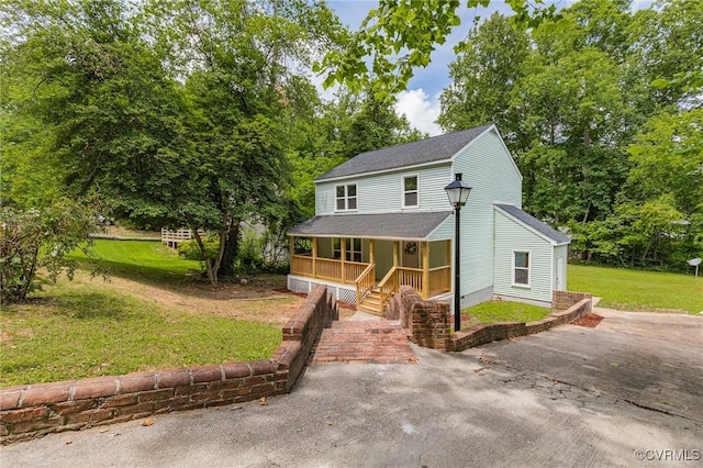 6910 Siliman Dr, Chesterfield, VA 23832 - view of front of home featuring a porch, a shingled roof, and a front lawn