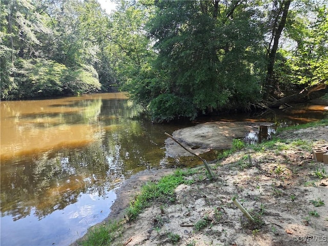 20803 Old Beaver Pond Rd, Mc Kenney, VA 23872 - water view featuring a heavily wooded area