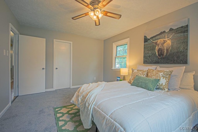 1300 Hyner Cir, Sandston, VA 23231 - carpeted bedroom with a textured ceiling and ceiling fan