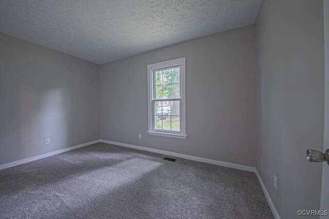 1300 Hyner Cir, Sandston, VA 23231 - carpeted spare room with a textured ceiling