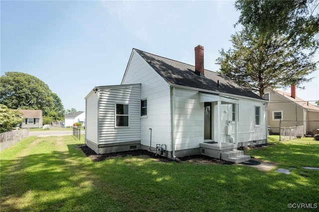 3912 Alma Ave, Henrico, VA 23222 - rear view of house with a chimney, crawl space, and roof with shingles