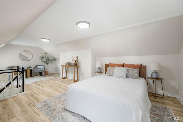 3912 Alma Ave, Henrico, VA 23222 - bedroom featuring lofted ceiling and wood finished floors