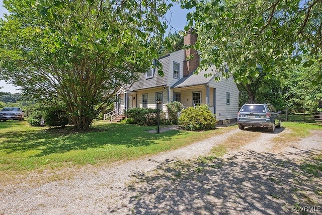 570 Three Chopt Rd, Manakin Sabot, VA 23103 - view of front facade with driveway and a chimney