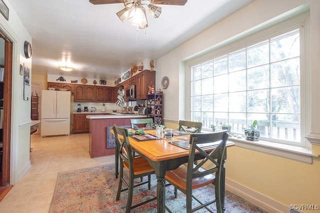570 Three Chopt Rd, Manakin Sabot, VA 23103 - dining space with a ceiling fan and plenty of natural light