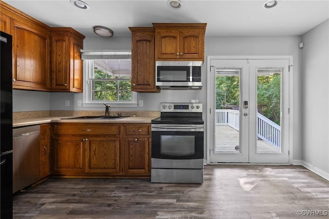 1203 Lemonwood Dr, North Prince George, VA 23860 - kitchen with stainless steel appliances, plenty of natural light, light countertops, french doors, and recessed lighting