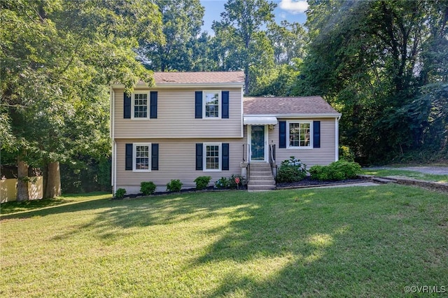 1203 Lemonwood Dr, North Prince George, VA 23860 - split level home featuring a front yard