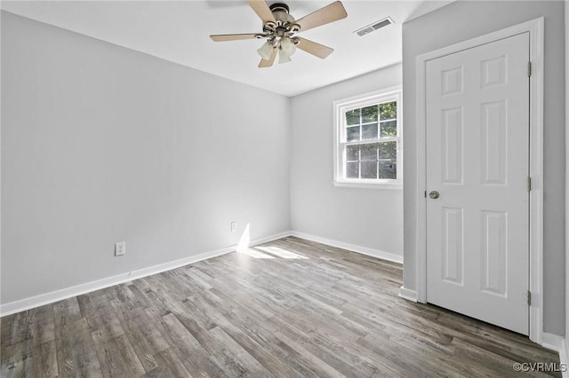 1203 Lemonwood Dr, North Prince George, VA 23860 - empty room with ceiling fan and wood finished floors