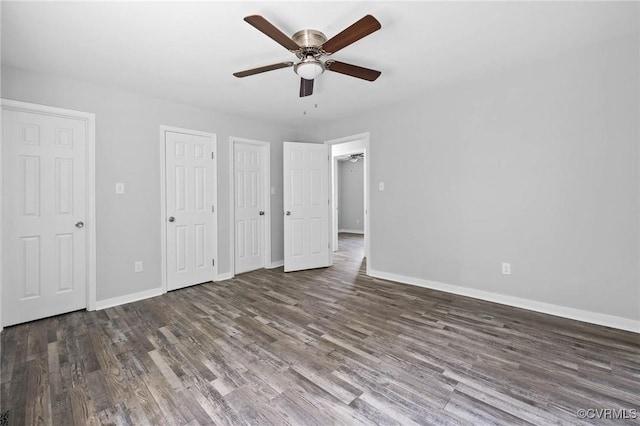 1203 Lemonwood Dr, North Prince George, VA 23860 - unfurnished bedroom featuring wood finished floors, ceiling fan, and two closets