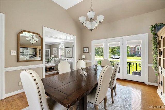 14230 Post Mill Dr, Midlothian, VA 23113 - dining space with a chandelier, light wood-type flooring, and high vaulted ceiling