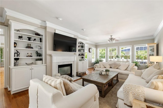 14230 Post Mill Dr, Midlothian, VA 23113 - living area featuring hardwood / wood-style flooring, crown molding, a premium fireplace, and ceiling fan