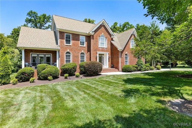 14230 Post Mill Dr, Midlothian, VA 23113 - view of front of house with brick siding and a front yard