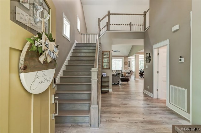 3016 Maple Grove Ln, Powhatan, VA 23139 - stairway with a towering ceiling and wood finished floors