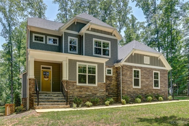 3016 Maple Grove Ln, Powhatan, VA 23139 - craftsman house with board and batten siding, stone siding, a shingled roof, and a front yard