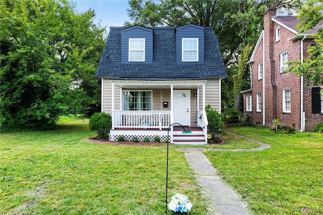 3220 Carolina Ave, Richmond, VA 23222 - view of front of house featuring covered porch, a front yard, and roof with shingles