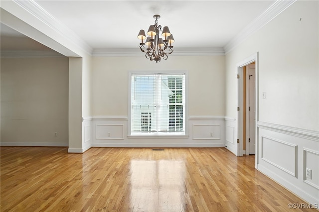 8248 Hampton Arbor Cir, Chesterfield, VA 23832 - unfurnished dining area featuring a chandelier, light wood-type flooring, ornamental molding, and a wainscoted wall