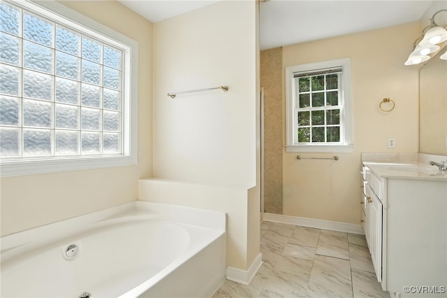 8248 Hampton Arbor Cir, Chesterfield, VA 23832 - full bath with marble look tiles, vanity, and a garden tub