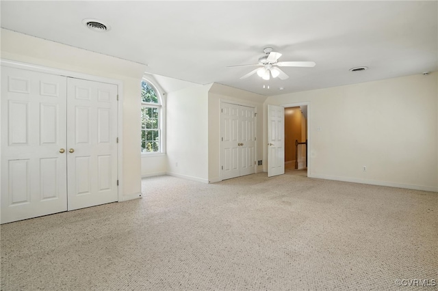 8248 Hampton Arbor Cir, Chesterfield, VA 23832 - unfurnished bedroom featuring multiple closets, a ceiling fan, and carpet flooring