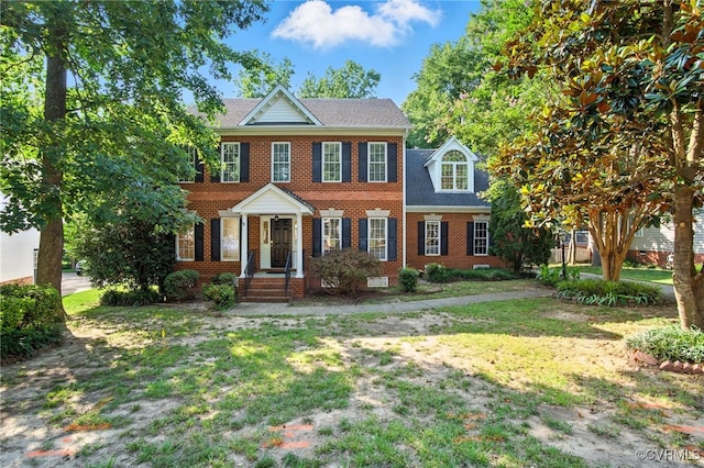 8248 Hampton Arbor Cir, Chesterfield, VA 23832 - colonial inspired home featuring brick siding, a front yard, and roof with shingles