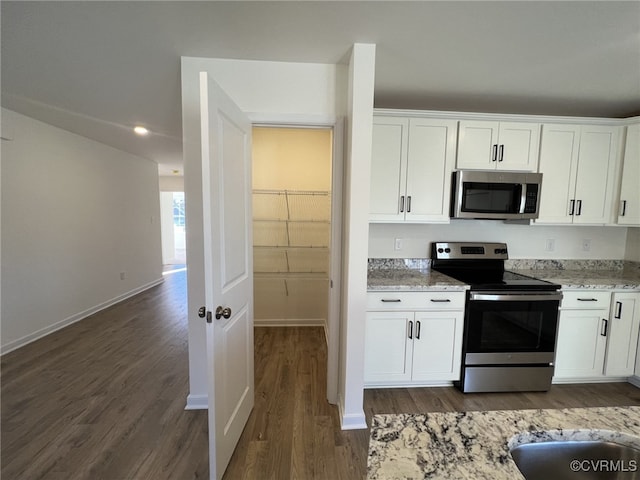 4917 Bailey Woods Ln, Midlothian, VA 23112 - kitchen featuring stainless steel appliances, dark wood-type flooring, white cabinetry, light stone countertops, and recessed lighting