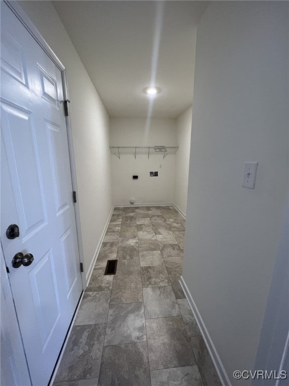 4917 Bailey Woods Ln, Midlothian, VA 23112 - laundry area featuring baseboards and dark stone finish flooring