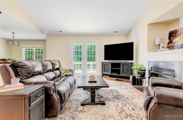 5773 S Jessup Rd, Chesterfield, VA 23832 - living area featuring lofted ceiling, wood finished floors, and a fireplace