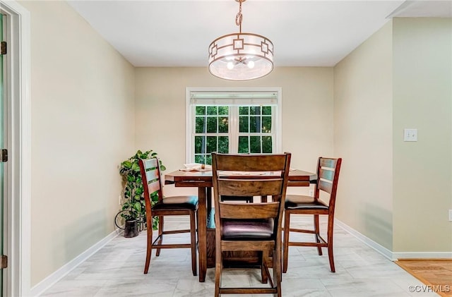 5773 S Jessup Rd, Chesterfield, VA 23832 - dining area featuring a chandelier and baseboards