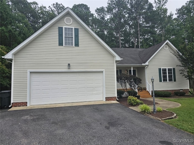 5773 S Jessup Rd, Chesterfield, VA 23832 - view of front facade with driveway, a porch, and crawl space
